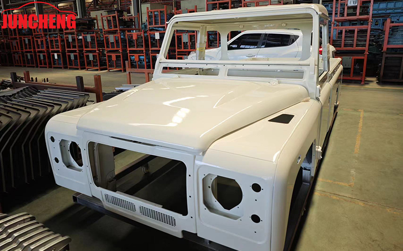 defender 110 pickup white